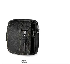 Detail view of black leather crossbody bag with lychee texture and side metal D-ring