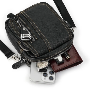 Black pebbled leather crossbody bag for men with multiple zipper pockets and adjustable strap