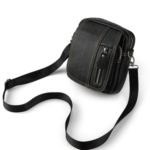 Versatile black leather crossbody bag with contrasting orange stitching and zippers