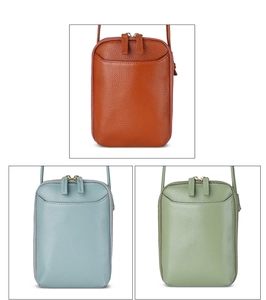 Vertical mini leather crossbody phone bags in caramel, light blue, and sage green shades