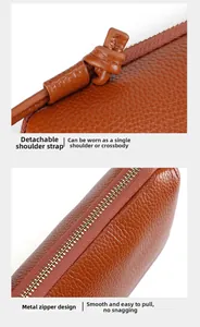 Brown litchi leather mini bag detail showing detachable strap and metal zipper