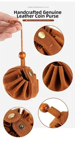 Detailed view of handmade crazy horse leather coin purse with drawstring and brass snap