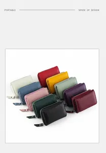 Detailed grid of ten colorful litchi grain leather wallets with zip closure