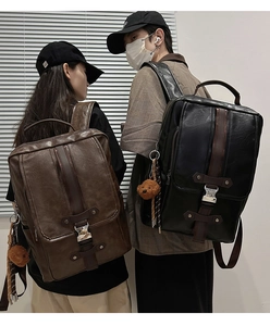 Men's vintage PU leather backpack details showing side view on models with metal buckles