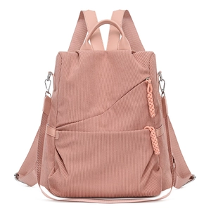 Pink corduroy multi-functional travel backpack with multiple pockets and versatile straps