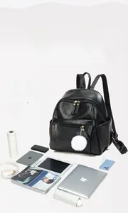 Detailed view of spacious black PU leather backpack showing large storage capacity and compartments