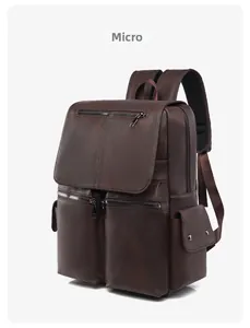 Side view of dark brown PU leather backpack showing storage pockets and texture