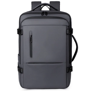 Minimalist grey business travel backpack with water-resistant fabric and side handles