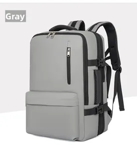 Vue latérale du sac à dos de voyage gris imperméable avec poignée et boucles réglables