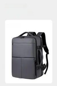 Macro view of water-resistant gray travel backpack showing buckle straps and padded side handle