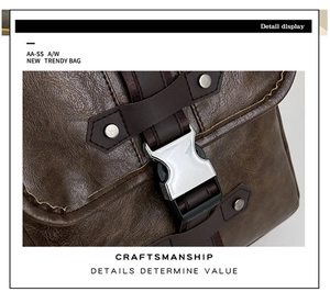 Detail of dark brown leather texture with silver metal buckle and reinforced stitching