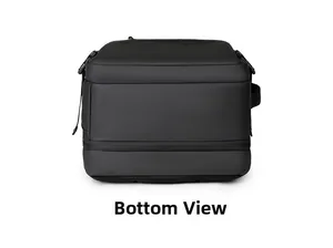 Bottom view of the durable black waterproof travel backpack showing reinforced seams