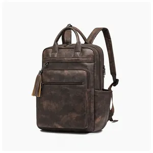 Detail of dark brown vintage PU leather backpack with tassel charm and side pocket