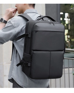 Detailed view of large black business backpack with breathable ergonomic shoulder straps
