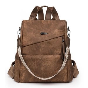 Bruine vintage anti-diefstal rugzak van Oxford kunstleer met een geweven riem
