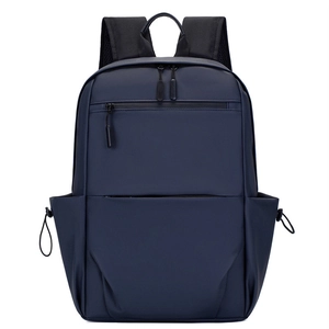 Waterproof navy blue business backpack with matte finish and padded shoulder straps