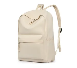 Detail view of the side pocket and front zipper on this minimalist cream-white backpack