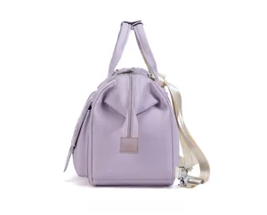 Side view of lavender nylon diaper bag with zipper closure and detachable woven shoulder strap