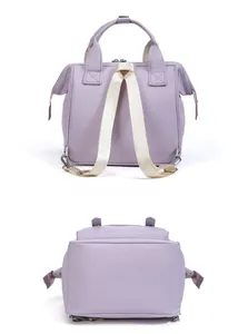 Detailed back and bottom view of lavender purple multi-functional maternity backpack with straps