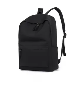 Side view of a black minimalist oxford fabric backpack with adjustable straps and side pockets