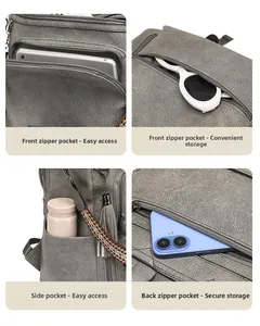 Detail view of large grey PU leather backpack showing multiple zip pockets and compartments