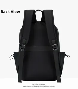 Rear view of black minimalist business backpack showing padded straps and side pockets