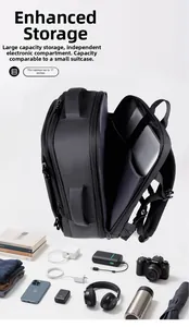 Detail of expandable black travel backpack showing deep interior with 17-inch laptop pocket