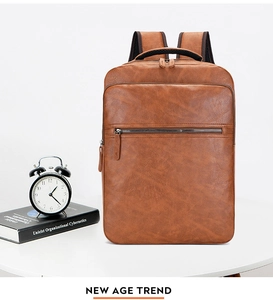 Detail of vintage brown PU leather backpack with sturdy handle and breathable mesh straps
