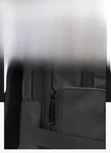 Close-up of durable black nylon fabric and metal zipper detail on business backpack