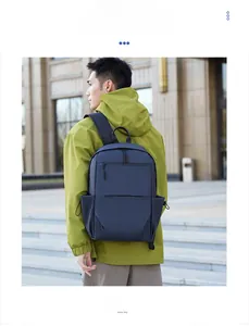 Outdoor view of a navy blue business backpack featuring waterproof nylon fabric and pockets