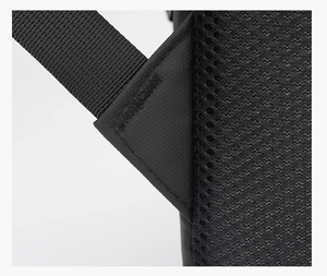 Detail of breathable honeycomb mesh padding and reinforced shoulder strap on business backpack