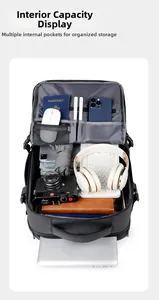 Internal view of a black business backpack showing multiple compartments and storage space