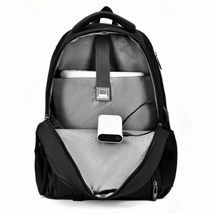 Detail view of large capacity travel backpack featuring padded laptop sleeve and USB port