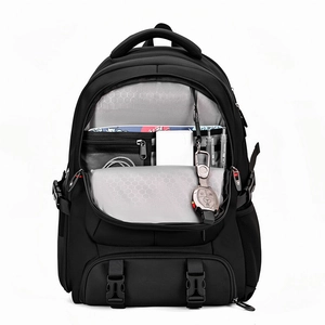 Detail of the multi-functional interior compartments and mesh pocket in the large travel backpack