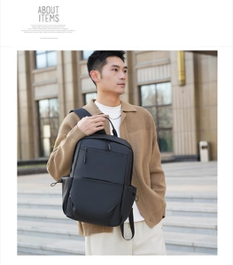Outdoor shot of a black business laptop backpack with waterproof fabric and side pockets