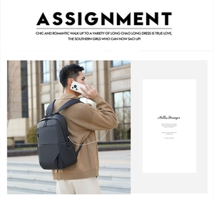 Detail of laptop backpack showing integrated side USB charging port for mobile devices