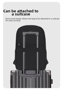 Detail of the back luggage strap on a black Oxford backpack for travel convenience