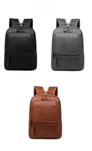 Detailed view of large business laptop backpacks in black, grey, and brown textured leather