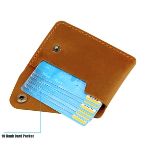 Detail view of handmade leather card holder in tan showing ten internal card slots