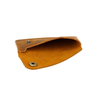 Detail view of handmade vintage cowhide card holder with retro bronze snap button