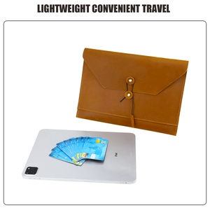 Detail of genuine leather document sleeve with secure rope string closure and fine stitching