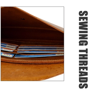 Close-up of internal multi-layer card slots and neat stitching of leather laptop case