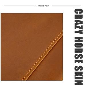 Close-up detail of genuine crazy horse leather texture and precise manual stitching