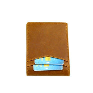 Detail of vintage brown leather wallet with multiple card slots and RFID protection features