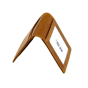 Detail of vintage leather wallet showing internal card slots and RFID protection window