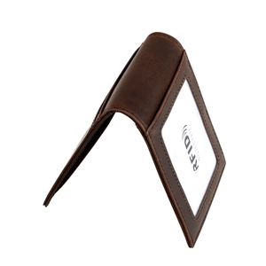 Detail of dark brown leather wallet showing RFID blocking card slot and premium stitching