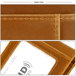 Detail of vintage leather wallet showing RFID protection slot and fine stitching