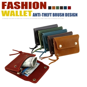 Detail of genuine leather wallets with RFID protection and secure metal snap closure
