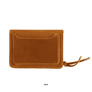 Detail view of the back pocket on a vintage crazy horse leather card holder wallet