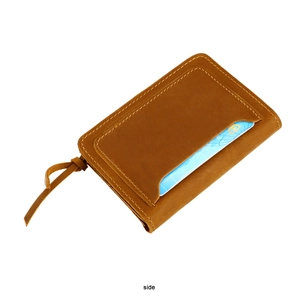 Side view of vintage brown crazy horse leather wallet with zipper and card slot